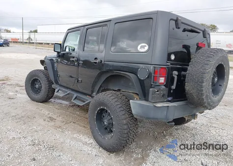 2011 Jeep Wrangler Unlimited Rubicon z USA, uszkodzony, nr VIN 1J4HA6H12BL585384